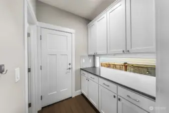 Butler pantry with coffee prep area- just to the left is the walk-in pantry & straight out the door is the garage.