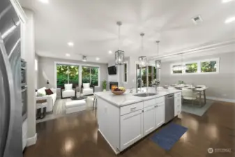 Step into a beautifully designed open kitchen featuring a spacious layout, modern shaker style cabinets, and stunning countertops. Perfect for hosting gatherings or creating culinary masterpieces.