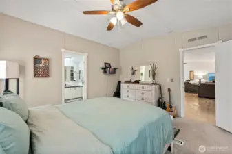 Primary Suite Easily Accommodates a King Size Bed! Ceiling Fan, & Newer Carpet!