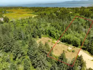 6.6 Acre Parcel with almost 20,000 square feet building site, electricity, cable, and road to the property. Come build your dream home