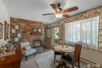 Dining room with door that leads out to a huge covered patio