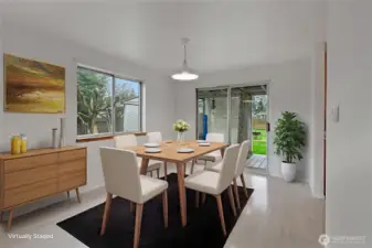 Dining area off kitchen, leads to patio outback. Great for BBQs.