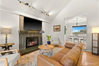 Wood burning fire place, vaulted ceilings, harwood flooring