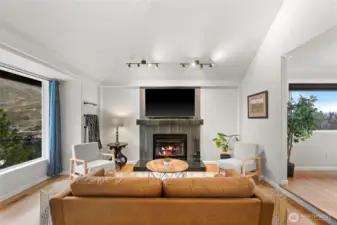 Tile wood burning fire place. Large picture windows