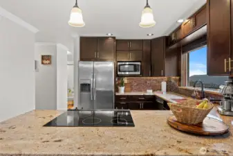 Granite counters, tile backsplash, well built cabinets, "WOW" views from kitchen!