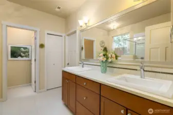 Primary ensuite bath with dual vanity and quartz countertops