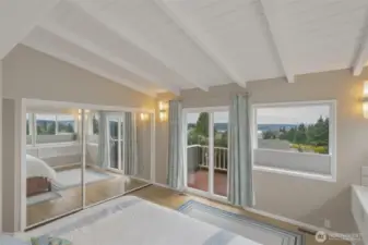 Vaulted ceilings, closets and primary suite sunset views welcome you home