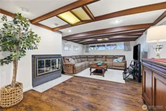 Nautical themed recreation room with fireplace.