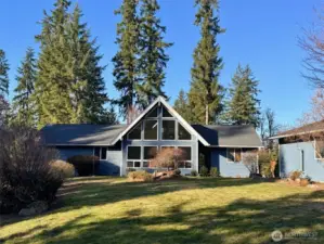 Remodeled farmhouse style rambler with panoramic valley and Cascade foothill views from numerous vantage points.