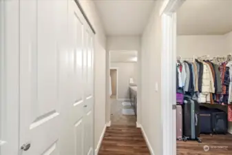 Two oversized primary closets lead to spa-like en-suite bath