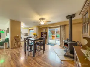 Dining area and a cozy wood fireplace. And