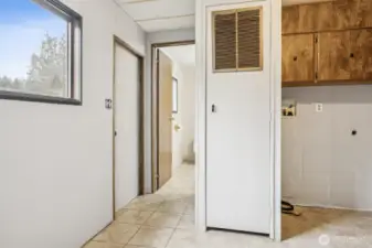 Utility room with door to back deck