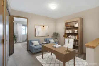 Bonus room at top of stairs can be used for a home office or whatever your needs. This photo has been virtually staged.