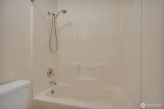 Sparkling clean tub and shower.