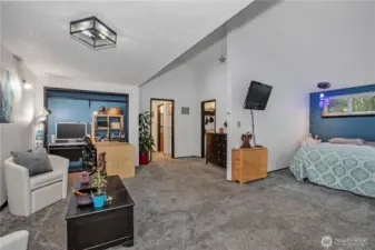 Primary bedroom has enough room for a little office area.