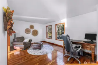 Dedicated office or flex room offers a quiet workspace with natural light. Ideal for remote work, hobbies, or additional living needs.