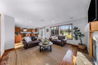 Another view of the main living area emphasizes connection to adjacent spaces and thoughtful layout. Clean lines and updated finishes support everyday living.