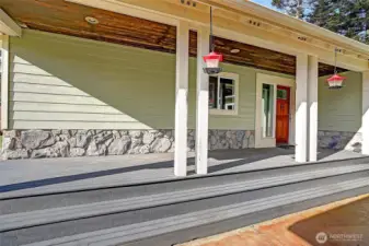 Covered front porch offers year round outdoor entertaining.