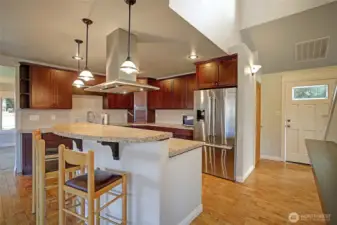 Tastefully designed kitchen with eating space.