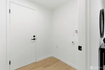 Laundry room with garage entrance