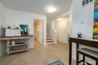 View of foyer at lower level entry as you walk through the door.