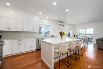 View of kitchen as you walk into home from the rear deck door or coming up the stairs from the lower level.