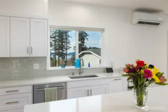 Enjoy the view from the breakfast bar in the kitchen.