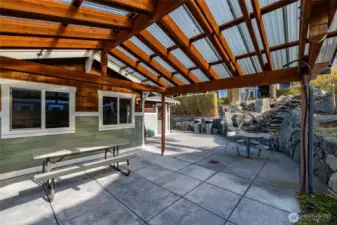 The club house has covered out door seatlng allowing you to expand your guest list.