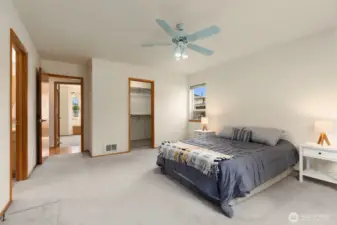 Primary bedroom with walk in closet