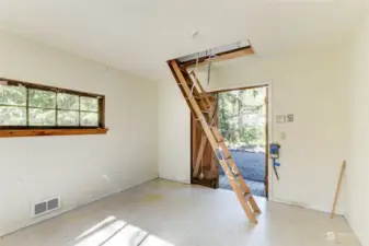 Pull down ladder for easy attic access.