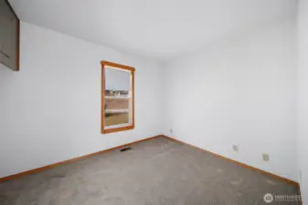 Bedroom #2 with new carpet.