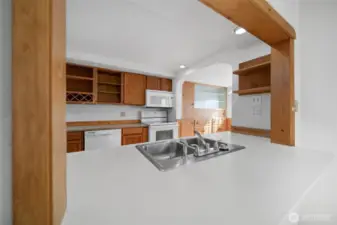 Pass-through from living room to kitchen.