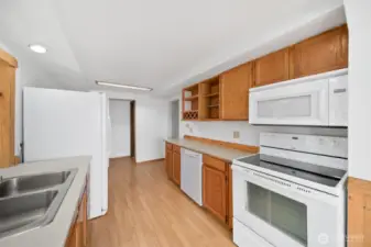 Kitchen with appliances included.