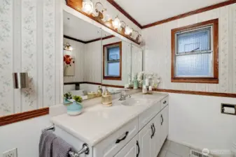 Spacious main floor bathroom has large walk-in shower.