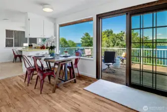 Well-engineered liveble design. Everyone can glide smoothly from inside to outside, plenty of space on the deck for special entertaining, large gatherings- front row seats to Seafair's Blue Angels!