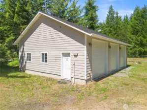 Side of the shop with man-door entrance.