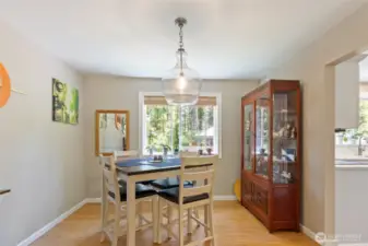 Dining room. Door to kitchen on the right.