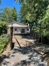 Please enter through driveway of 422 S 124th Street.