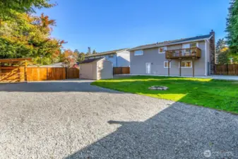 Fully fenced backyard with beautifully stained fencing.