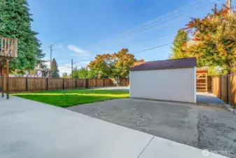 Large shed or workshop with RV hookup inplace.