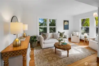 Living room. FYI looking out the window in the middle of the photo, you'll find the Magnolia fields... used for soccer, baseball, general use, dog walking, picnicking, you name it.
