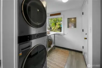 Great mudroom with convenient, and newer (2021) high efficiency LG washer & dryer. All right, let's go outside.