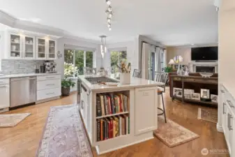 The kitchen offers versatile dining options to suit every occasion. A spacious island features a built-in eating bar, perfect for casual meals, morning coffee, or keeping the cook company while preparing dinner. Just steps away, an additional dining space provides a bright and inviting setting for family meals or entertaining guests, with plenty of room to gather and enjoy the heart of the home together.