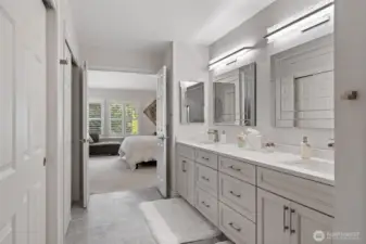 From this angle, the ensuite bathroom reveals its spacious layout and refined details.