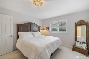 From this perspective, the 2nd bedroom showcases its spacious layout and abundant natural light.