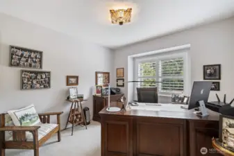 The fourth bedroom is generously sized and filled with natural light.  Use as a guest room, home office, or personal retreat. Thoughtfully designed, this bedroom combines comfort and style while seamlessly complementing the home’s overall aesthetic.