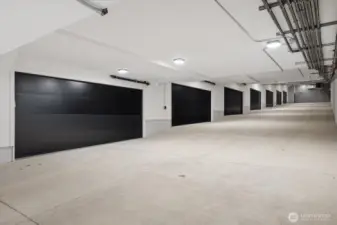 Striking commercial-grade, industrial garage crafted with over 14 million pounds of concrete—bold, rare, and architecturally impressive.