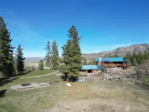 Carefully tended but mostly natural rounds offer a variety of spaces for gathering, such as the picnic/bbq space near the seasonal/occasional pond. This natural pond fills up sometimes, and at other times makes a great space for lawn games!