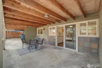 Opens to covered and expansive patio