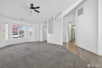Living Room showing front door and hallway to bedrooms